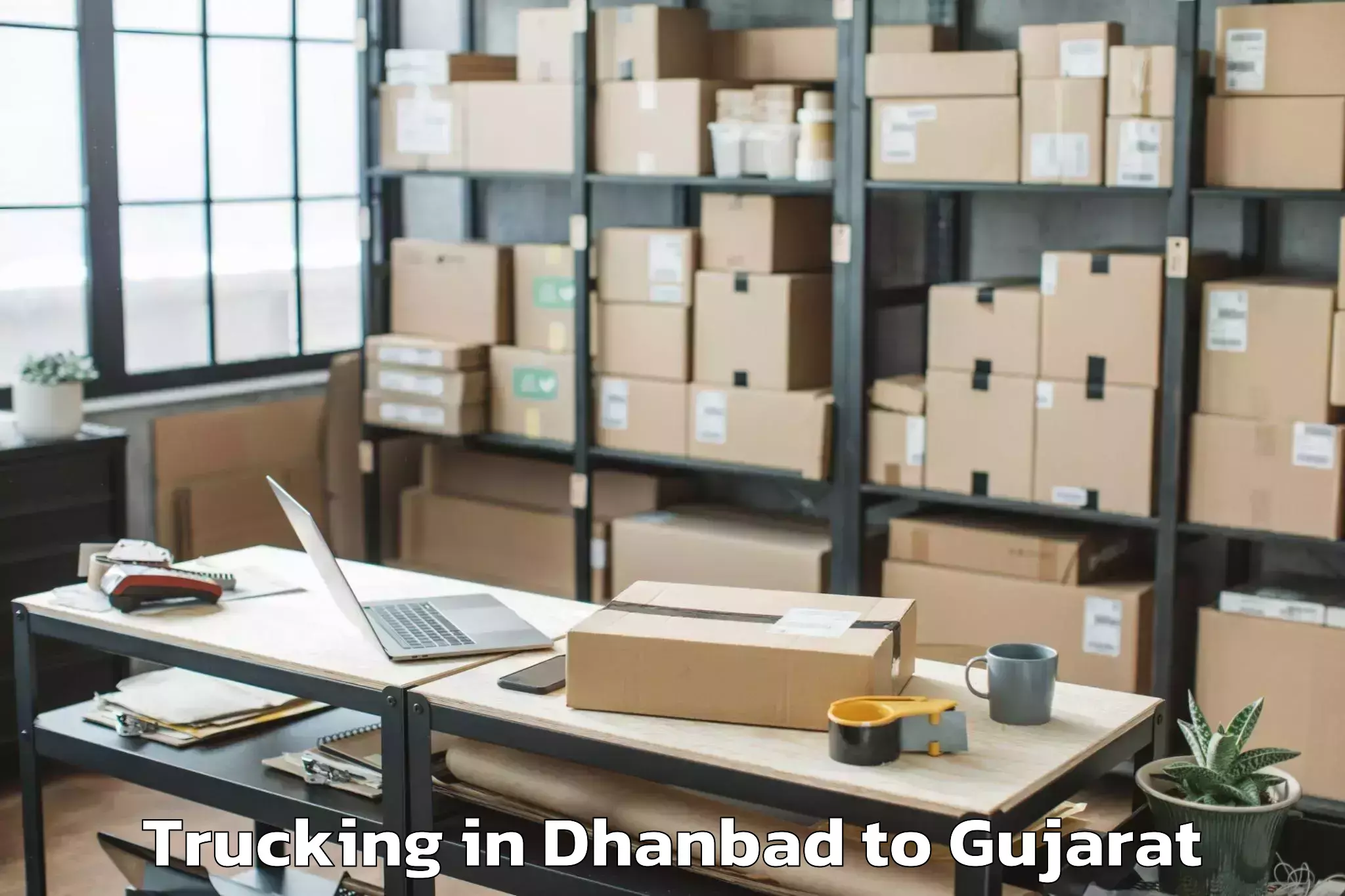 Top Dhanbad to Surat Trucking Available